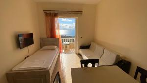 Giường trong phòng chung tại OniRana Apartments