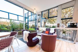 Χώρος καθιστικού στο Mercure Paris Montmartre Sacré Coeur