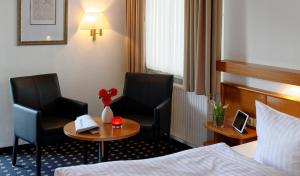 Postel nebo postele na pokoji v ubytování Trend Hotel