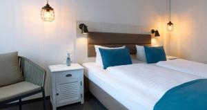 Postel nebo postele na pokoji v ubytování Trend Hotel