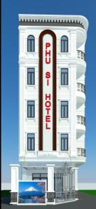 a white hotel with a red sign on it at Cát tường 2 hotel in Ho Chi Minh City