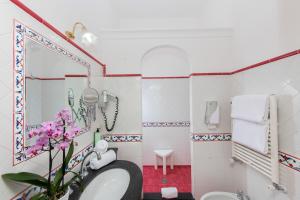 Koupelna v ubytování Hotel Reginella