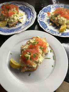 a plate of food with a piece of food at Broadstairs House Boutique B&B By The Sea in Broadstairs