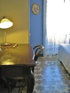Voodi või voodid majutusasutuse B&B L'Orto Sul Tetto toas