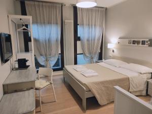 Voodi või voodid majutusasutuse BED in BO Saragozza toas