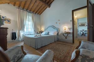 Ένα ή περισσότερα κρεβάτια σε δωμάτιο στο Villa la Fenice - Teloni +35 φωτογραφίες