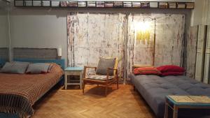 Posteľ alebo postele v izbe v ubytovaní Studio Klimat MOKOTÓW