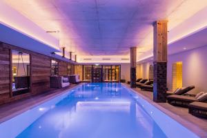 Bazén v ubytování PAPA RHEIN - Hotel & Spa nebo v jeho okolí