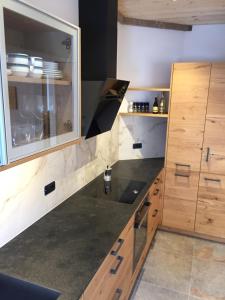 A kitchen or kitchenette at Cësa Gredine