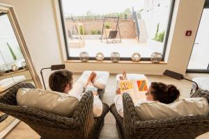 Posezení v ubytování PAPA RHEIN - Hotel & Spa
