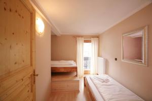Posteľ alebo postele v izbe v ubytovaní MABERO Penthouse 101 + 8 fotografií