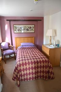 Postel nebo postele na pokoji v ubytování The Anglers Retreat