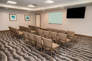 a conference room with chairs and a screen at Staybridge Suites - Nashville - Franklin by IHG in Franklin +66 photos