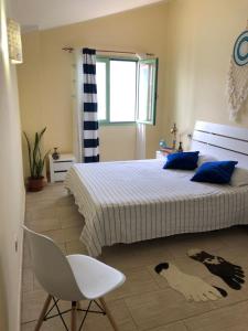 Postelja oz. postelje v sobi nastanitve More then a beautiful apart The real Morabeza Capeverdean hospitality