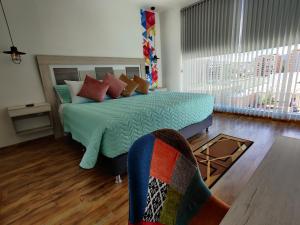 Postel nebo postele na pokoji v ubytování Hotel Aristo Gold