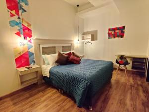 Postel nebo postele na pokoji v ubytování Hotel Aristo Gold