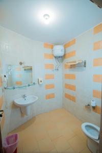 a bathroom with a sink and a toilet at Panda resort in Dahab +118 photos