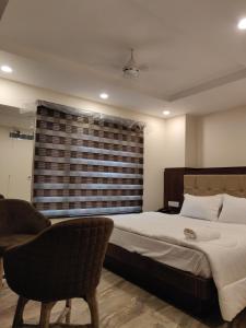 Postel nebo postele na pokoji v ubytování THE GRACE HOUSE Paharganj
