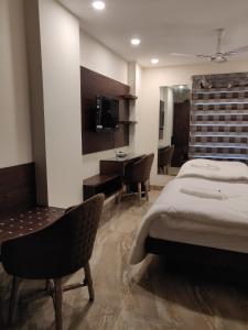 Postel nebo postele na pokoji v ubytování THE GRACE HOUSE Paharganj