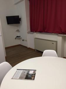 A television and/or entertainment centre at Residence Panigale