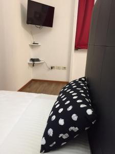 A bed or beds in a room at Residence Panigale