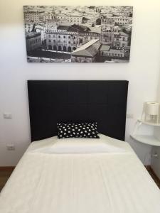 A bed or beds in a room at Residence Panigale