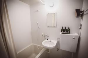 Koupelna v ubytování Yanbaru Hostel
