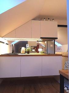 Kuchyň nebo kuchyňský kout v ubytování Brunetti Apartmány Jeseníky