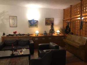 Lobby/Rezeption in der Unterkunft Club Dolomiti Hotel&Villa
