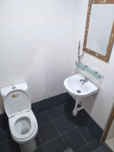 Ένα μπάνιο στο Motel Kampung Kuah