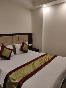 Postel nebo postele na pokoji v ubytování THE GRACE HOUSE Paharganj