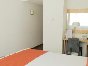 Voodi või voodid majutusasutuse Le Pietri Urban Hotel toas