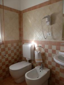 A bathroom at Hotel Nautic B&B
