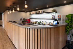 El lounge o bar de Zig Zag Motel & Apartments
