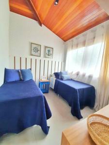 Posteľ alebo postele v izbe v ubytovaní Villagio di Mare
