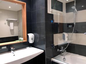 Vannituba majutusasutuses Le Pietri Urban Hotel
