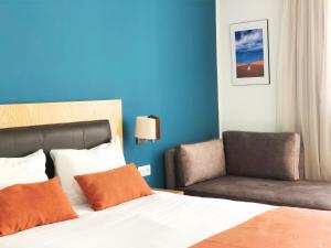 Voodi või voodid majutusasutuse Le Pietri Urban Hotel toas