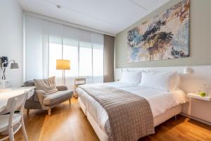 Postel nebo postele na pokoji v ubytování WestCord Hotel Delft