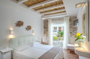 Letto o letti in una camera di Adriani Hotel