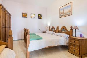 Postel nebo postele na pokoji v ubytování Finca Carrillo