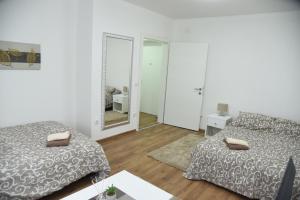 Letto o letti in una camera di Apartmani Sofronic Loznica 1