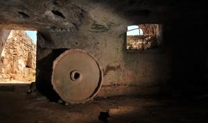 an old room with a window in a building at Masseria Spina Resort in Monopoli