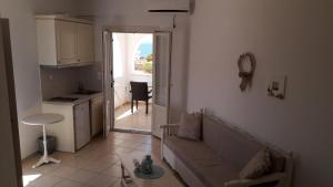 A kitchen or kitchenette at Agiassos Naxos Apartments