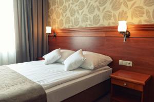 Posteľ alebo postele v izbe v ubytovaní Hotel Jamajka & SPA