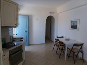 A kitchen or kitchenette at Agiassos Naxos Apartments
