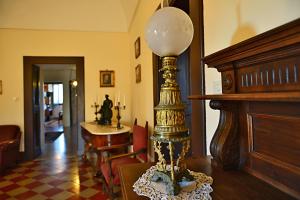 a lamp sitting on a table in a room at Masseria Spina Resort in Monopoli