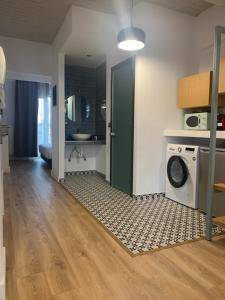 Kuchyňa alebo kuchynka v ubytovaní White Bottle Superior Apartments