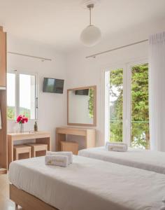 Cama ou camas em um quarto em Studios Angeliki