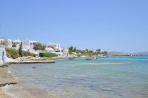 a view of a beach with boats in the water at Casa Mare Pollonia in Pollonia