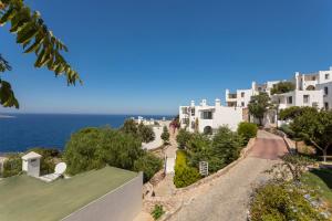 arial view of a villa with the ocean in the background at Vega Aparts in Gümüşlük